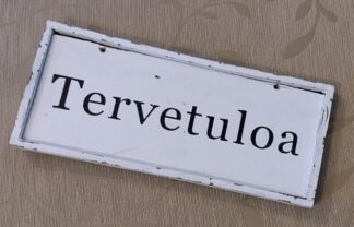 Tervetuloa-kyltti